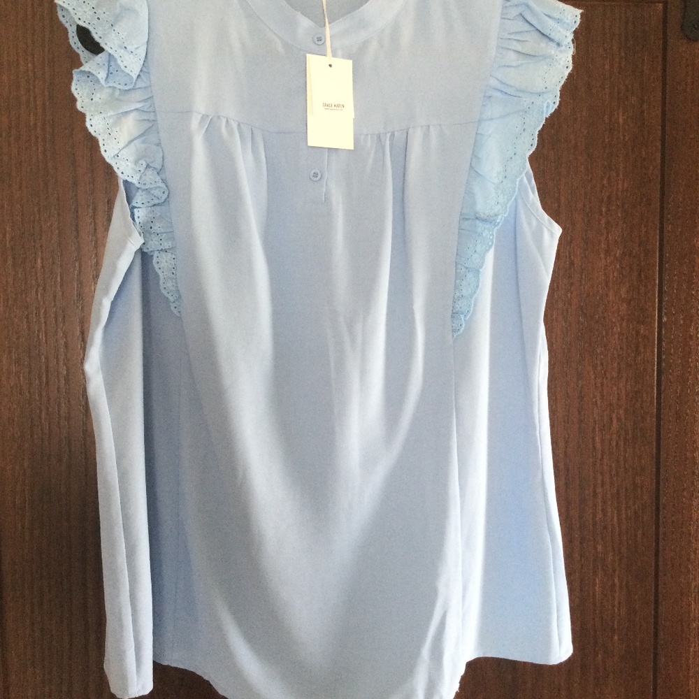 GRACE Karin White Sleeveless Shirt size 2XL.  Ruffled shoulders & button neck.